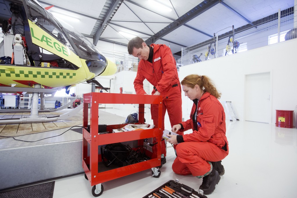 Having a new base means tweaking things, in this case a table trolley. Denmarks first air ambulance serivce, operated by Norwegian Air Ambulance. The crew is pilot Jan Nielsen, HEMS paramedic Lars Greve-Wilms and doctor Rikke Helene Rasmussen. The crew operate an Airbus EC-135 out of the Ringsted base, one of three bases in Denmark.